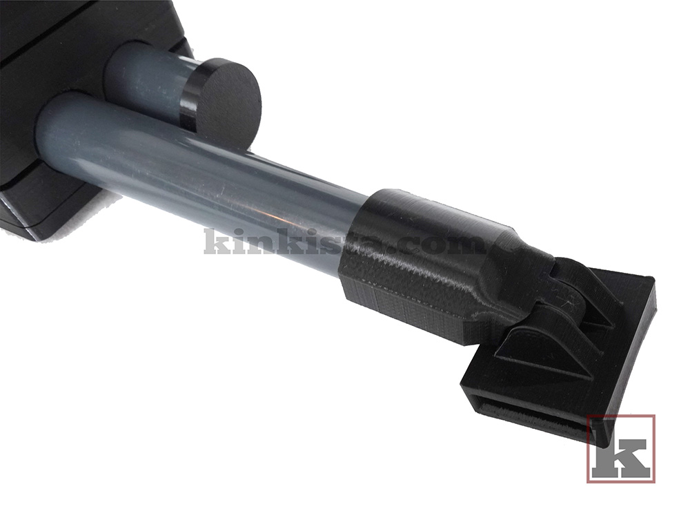 Close-up of neck-to-thigh frame BDSM restraint showing metal bars and adjustment points
