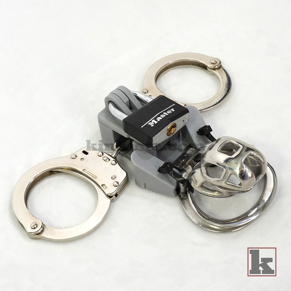 Left side view - Integrated restraint setup with cage and wrist cuffs connected