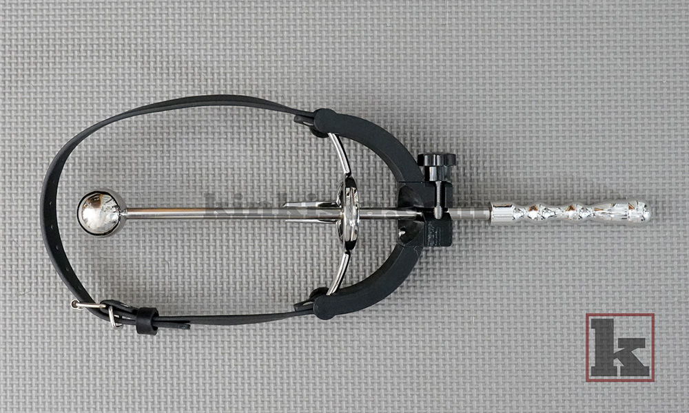 Kinkista deepthroat training gag featuring a locked stainless steel insert