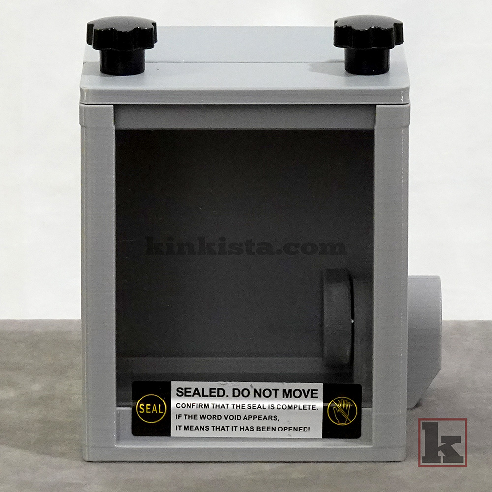 Kinkista Emergency Keybox for domestic captivity kink play, front view with clear acrylic window and VOID security label